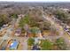 Wide aerial view of the property showing its location in a tree-lined neighborhood at 770 Waters Sw Dr, Atlanta, GA 30310