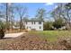 The rear of the house with a wooden deck and private backyard at 770 Waters Sw Dr, Atlanta, GA 30310