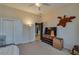 Spacious bedroom featuring carpet, closet space, and modern lighting for comfortable living at 832 Chalet Hls, Mcdonough, GA 30253