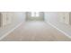 Bedroom with neutral walls, carpet, small window, and storage on either side of the wall at 1070 Thornwood Cir, Covington, GA 30016