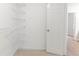 Walk-in closet featuring wire shelving for optimal organization at 1070 Thornwood Cir, Covington, GA 30016