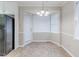 Cozy dining nook with bright windows, adjacent to kitchen and appliances at 1070 Thornwood Cir, Covington, GA 30016