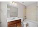 Full bathroom with vanity, mirror, tub and shower combination, and tile flooring at 4590 Wollaston Road, Cumming, GA 30041