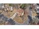 An aerial view of the property features mature trees, landscaping, and a driveway at 10950 Glenhurst Pass, Duluth, GA 30097