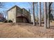 Spacious backyard featuring a raised wood deck, great for outdoor gatherings and peaceful enjoyment at 10950 Glenhurst Pass, Duluth, GA 30097