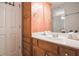 Cozy bathroom with wooden vanity, and a spacious countertop at 55 Little Barley Ln, Grayson, GA 30017