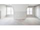 Upstairs bedroom featuring plush carpeting, neutral walls, and double windows at 55 Little Barley Ln, Grayson, GA 30017