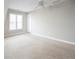 Bedroom with neutral walls, plush carpeting, and ceiling fan at 55 Little Barley Ln, Grayson, GA 30017