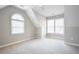 Bedroom featuring vaulted ceilings, multiple windows, and plush carpeting at 55 Little Barley Ln, Grayson, GA 30017