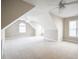 Large bonus room with neutral walls, plush carpeting, and multiple ceiling fans at 55 Little Barley Ln, Grayson, GA 30017