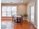 Bright and airy breakfast area with a round table and chairs set near a large window at 55 Little Barley Ln, Grayson, GA 30017