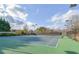 Well-maintained tennis courts with lighting offer residents a recreational amenity for sports and outdoor activities at 55 Little Barley Ln, Grayson, GA 30017
