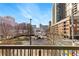 Scenic view from a balcony showcasing the city skyline and building entrances at 1075 Peachtree Walk # A-307, Atlanta, GA 30309