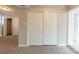 Bedroom featuring large closet space and neutral carpet at 3090 Chimney W Rdg, Snellville, GA 30078