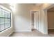 Bedroom featuring neutral carpet, walls, and open doorway at 3090 Chimney W Rdg, Snellville, GA 30078