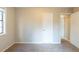 Bedroom featuring neutral colored walls, plush carpeting, and a bright, open feel at 3090 Chimney W Rdg, Snellville, GA 30078