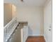 Hallway and staircase featuring hardwood floors near the front door at 3090 Chimney W Rdg, Snellville, GA 30078