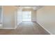 Spacious living room with new carpet and lots of natural light at 3090 Chimney W Rdg, Snellville, GA 30078