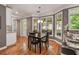 Cozy dining area with natural light, hardwood floors, and modern decor at 4580 Windsor Park Place, Atlanta, GA 30342