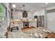 Bright kitchen featuring granite countertops, stainless steel appliances, and white cabinets at 4580 Windsor Park Place, Atlanta, GA 30342