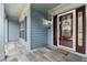 Welcoming front porch with tiled flooring, and an inviting front door at 923 Buckhorn Bnd, Locust Grove, GA 30248