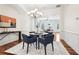 Open dining room with a view into the living room, showcasing a modern table and stylish decor at 1670 Sabastian Ne Pt, Atlanta, GA 30329