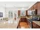 Spacious kitchen featuring stainless steel appliances, granite countertops, and ample cabinet space at 1670 Sabastian Ne Pt, Atlanta, GA 30329