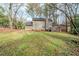 Large backyard with a lawn and a patio, great for outdoor entertaining at 1838 Nicole Ln, Lithonia, GA 30058