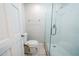 Recently renovated bathroom with white subway tile shower with a frameless glass door at 1838 Nicole Ln, Lithonia, GA 30058