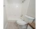 Clean bathroom with a shower-tub combination and tile flooring at 1838 Nicole Ln, Lithonia, GA 30058