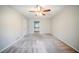 Spacious carpeted bedroom with neutral paint and a view of the en-suite bathroom at 1838 Nicole Ln, Lithonia, GA 30058