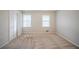 Bedroom with natural light and closet with louvered doors at 1838 Nicole Ln, Lithonia, GA 30058
