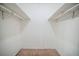Walk-in closet features a bare and customizable space with built-in shelving at 1838 Nicole Ln, Lithonia, GA 30058