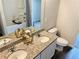 Modern bathroom featuring double vanity with granite countertop and a shower-tub combination at 720 Dove Tree Ln, Social Circle, GA 30025