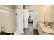 Bathroom featuring double vanity, granite countertops, and a shower-tub combo at 720 Dove Tree Ln, Social Circle, GA 30025