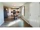 Open concept living room and kitchen with modern appliances and wood-look flooring at 720 Dove Tree Ln, Social Circle, GA 30025