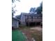 View of the wooden deck with gray siding on the house at 1268 Wylie Se St, Atlanta, GA 30317