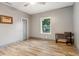 Spacious bedroom with gray walls, new floors, a ceiling fan and a window that provides natural light at 1268 Wylie Se St, Atlanta, GA 30317