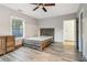 Large bedroom with hardwood floors, ceiling fan, and natural light at 1268 Wylie Se St, Atlanta, GA 30317