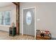 Entryway featuring a gray front door with decorative glass and wood flooring at 1268 Wylie Se St, Atlanta, GA 30317