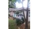 Side view of the home with a bright turquoise door and a cozy covered porch at 1268 Wylie Se St, Atlanta, GA 30317