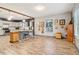 Open concept kitchen with gray cabinets, granite counters, and a center island at 1268 Wylie Se St, Atlanta, GA 30317