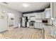 Spacious kitchen featuring gray cabinetry, subway tile backsplash and stainless steel appliances at 1268 Wylie Se St, Atlanta, GA 30317