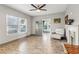 Cozy living room with wood-look floors, a fireplace, and a white reclining chair at 1268 Wylie Se St, Atlanta, GA 30317