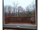 View from window showing back deck for outdoor relaxation and views at 1831 Nours Landing Way, Duluth, GA 30097