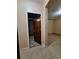 Unfinished basement with open door perfect for a home gym or storage at 1831 Nours Landing Way, Duluth, GA 30097