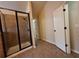 Bathroom featuring a glass-enclosed shower, tiled walls, and tile flooring at 1831 Nours Landing Way, Duluth, GA 30097