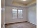 Bedroom featuring neutral walls, carpet flooring, and a large window at 1831 Nours Landing Way, Duluth, GA 30097