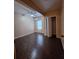 Bedroom featuring hard wood floors, ceiling fan and a closet at 1831 Nours Landing Way, Duluth, GA 30097