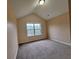 Spacious bedroom featuring neutral walls, plush carpeting, and a bright window at 1831 Nours Landing Way, Duluth, GA 30097